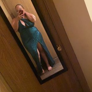 Green sequin gown with split